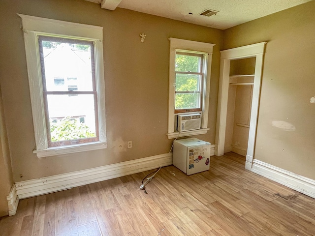 629 Farrington St, Saint Paul, MN 55103 - unfurnished bedroom with cooling unit and light wood-style floors