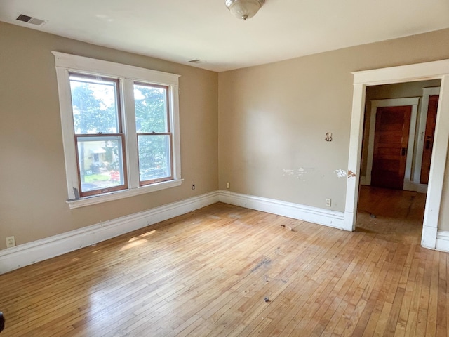 629 Farrington St, Saint Paul, MN 55103 - unfurnished room with light wood finished floors