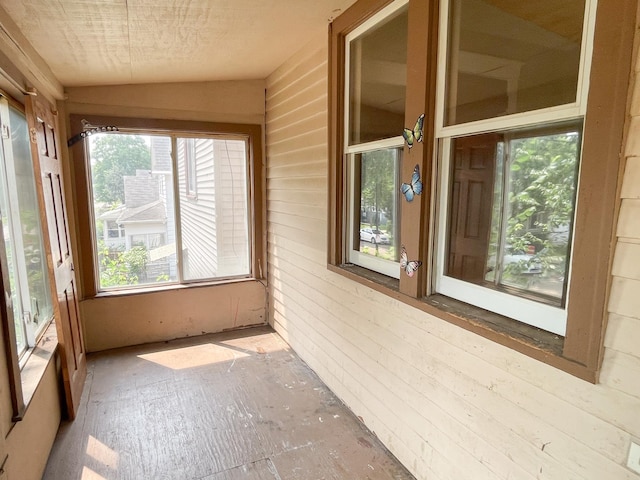 629 Farrington St, Saint Paul, MN 55103 - unfurnished sunroom with vaulted ceiling