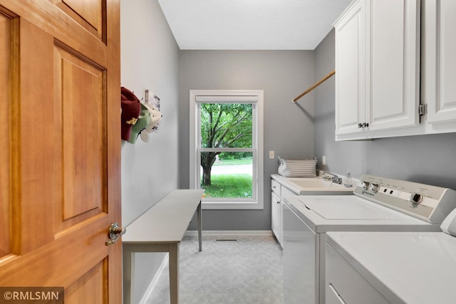 13840 Edenwood Way, Apple Valley, MN 55124 - washroom with cabinet space and washing machine and clothes dryer