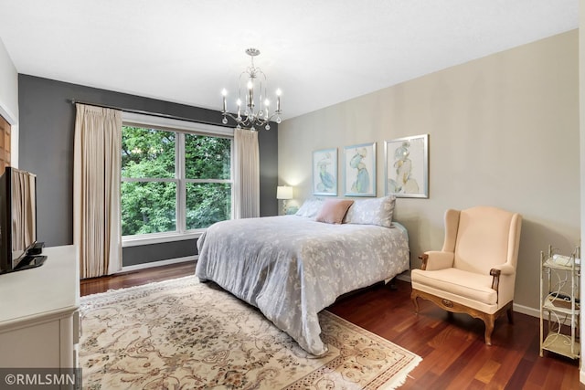13840 Edenwood Way, Apple Valley, MN 55124 - bedroom with wood finished floors and a chandelier