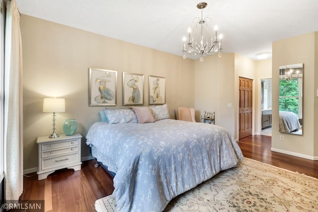 13840 Edenwood Way, Apple Valley, MN 55124 - bedroom with a chandelier, wood finished floors, and a closet