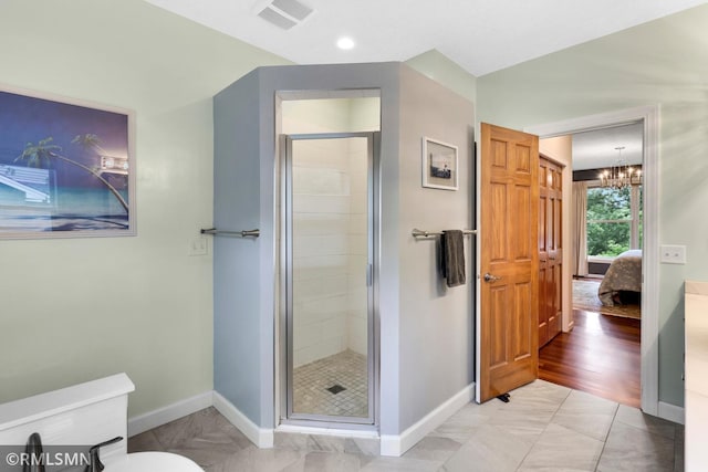 13840 Edenwood Way, Apple Valley, MN 55124 - ensuite bathroom featuring a chandelier and a shower stall