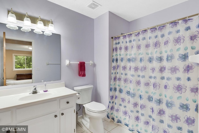 13840 Edenwood Way, Apple Valley, MN 55124 - full bath with vanity, tile patterned flooring, and a shower with shower curtain