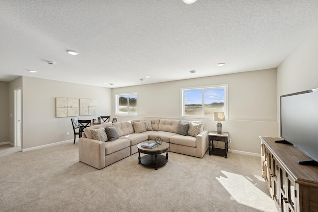757 Greywood Blvd SW, Delano, MN 55328 - living room with light colored carpet, a textured ceiling, and recessed lighting