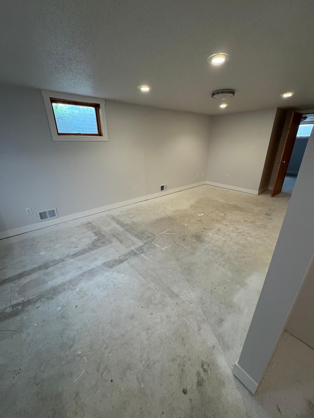 406 22nd St S, Fargo, ND 58103 - below grade area featuring recessed lighting and baseboards