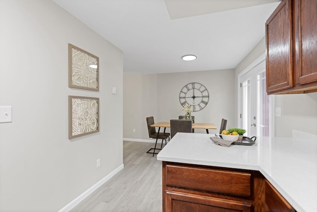 6494 Bonner Ct, Inver Grove Heights, MN 55076 - kitchen with light wood finished floors and light countertops