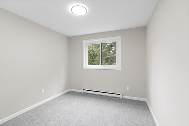 6494 Bonner Ct, Inver Grove Heights, MN 55076 - spare room featuring baseboard heating and carpet floors
