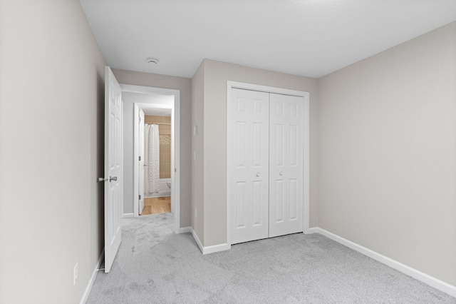 6494 Bonner Ct, Inver Grove Heights, MN 55076 - unfurnished bedroom featuring carpet and a closet