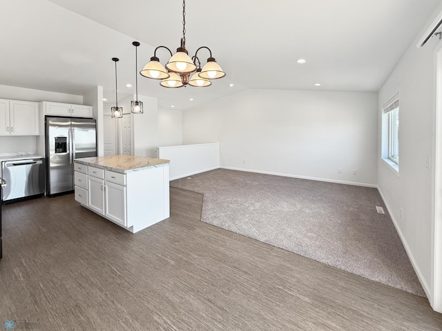 4832 51st Ave S, Fargo, ND 58104 - kitchen featuring stainless steel appliances, white cabinets, pendant lighting, a chandelier, and recessed lighting