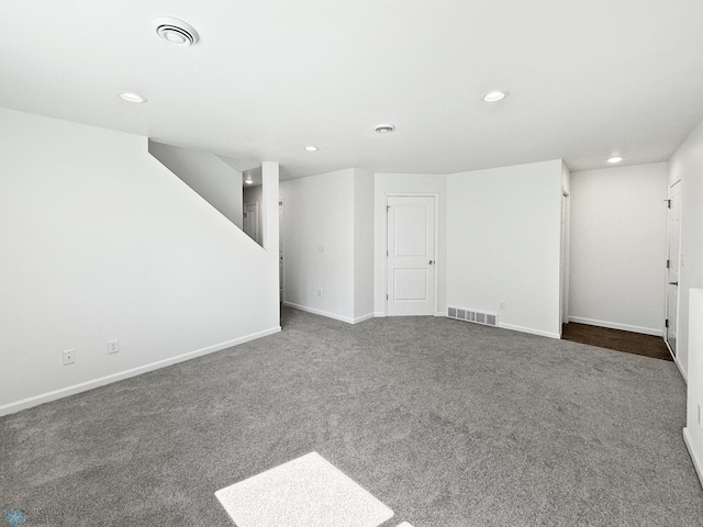 4832 51st Ave S, Fargo, ND 58104 - unfurnished living room with recessed lighting and dark carpet