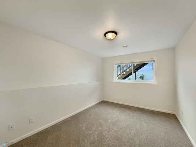 4832 51st Ave S, Fargo, ND 58104 - empty room featuring carpet floors and baseboards
