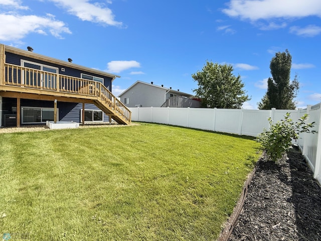 4832 51st Ave S, Fargo, ND 58104 - fenced backyard with stairway and a wooden deck
