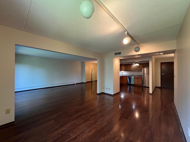 2485 Londin Ln E Unit 418, Maplewood, MN 55119 - unfurnished living room featuring a baseboard radiator, dark wood-style flooring, a textured ceiling, and rail lighting