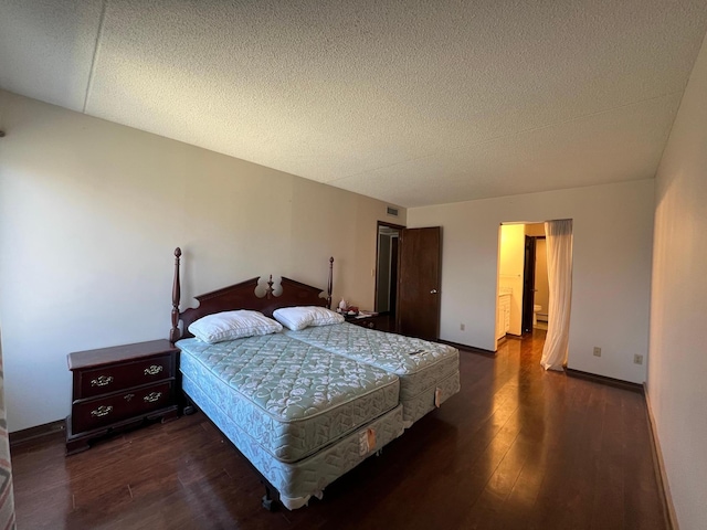 2485 Londin Ln E Unit 418, Maplewood, MN 55119 - bedroom with dark wood-style flooring and a textured ceiling