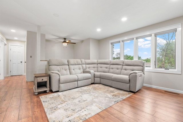 540 4th St E, Wanamingo, MN 55983 - living room with light wood-style floors, ceiling fan, and recessed lighting