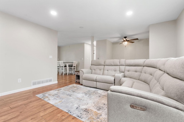 540 4th St E, Wanamingo, MN 55983 - living area with a ceiling fan, wood finished floors, and recessed lighting