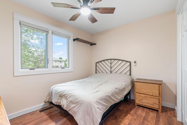 540 4th St E, Wanamingo, MN 55983 - bedroom with wood finished floors and ceiling fan