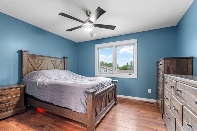 540 4th St E, Wanamingo, MN 55983 - bedroom featuring wood-type flooring and a ceiling fan