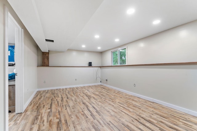 540 4th St E, Wanamingo, MN 55983 - unfurnished room with wood finished floors and recessed lighting