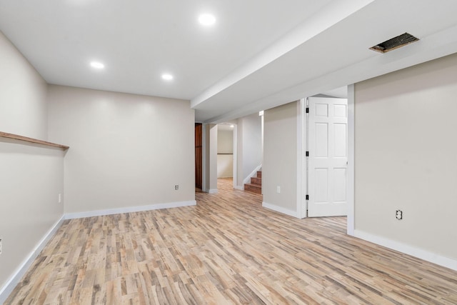 540 4th St E, Wanamingo, MN 55983 - finished basement with light wood-style floors, stairway, and recessed lighting