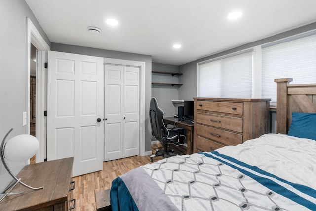 540 4th St E, Wanamingo, MN 55983 - bedroom with light wood finished floors, a closet, an office area, and recessed lighting