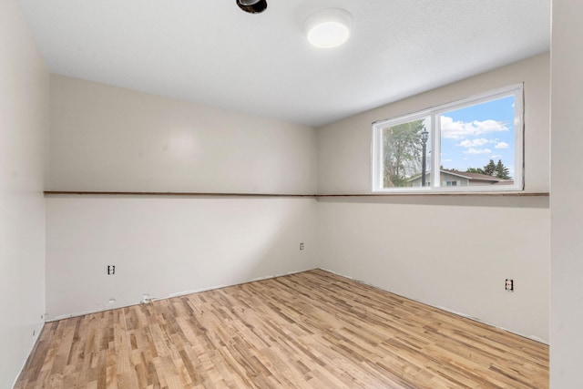 540 4th St E, Wanamingo, MN 55983 - empty room with light wood-type flooring