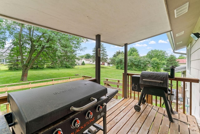 540 4th St E, Wanamingo, MN 55983 - wooden deck with a grill and a yard