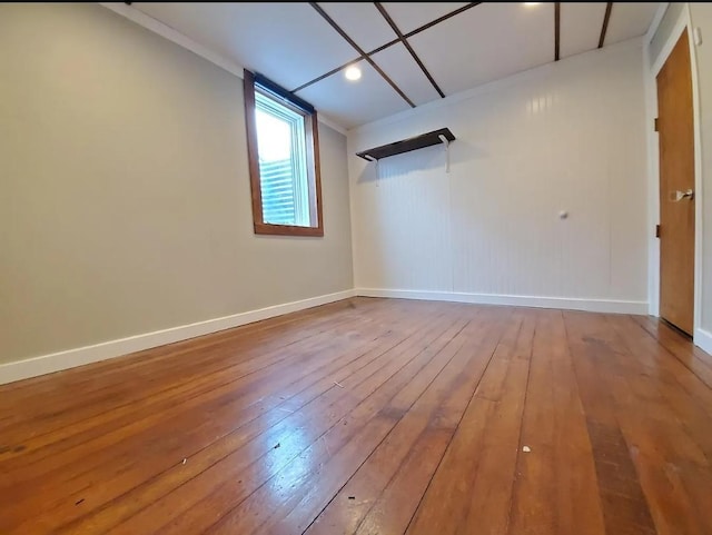 1138 7th Ave SE, Rochester, MN 55904 - empty room with wood-type flooring and baseboards