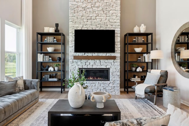 14540 106th Pl N, Maple Grove, MN 55369 - living area featuring a fireplace and wood finished floors