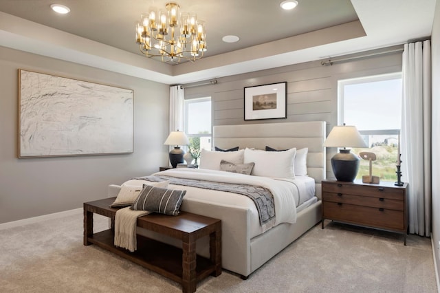 14540 106th Pl N, Maple Grove, MN 55369 - bedroom with light carpet, a raised ceiling, a chandelier, and recessed lighting