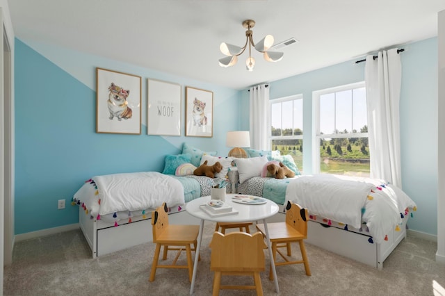 14540 106th Pl N, Maple Grove, MN 55369 - bedroom with a chandelier and carpet floors