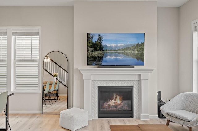 8120 Arrowwood Ln N, Maple Grove, MN 55369 - living area featuring wood finished floors and a tile fireplace