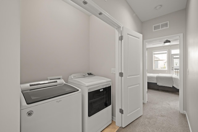 8120 Arrowwood Ln N, Maple Grove, MN 55369 - laundry room with washer and dryer, light carpet, and a ceiling fan
