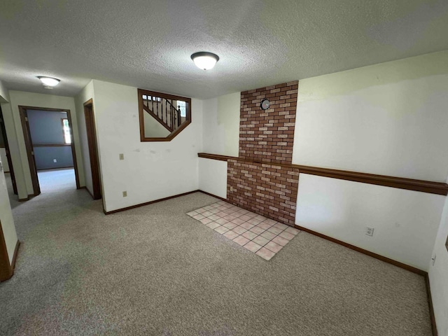 18627 148th St NW, Big Lake Twp, MN 55330 - unfurnished room featuring light carpet, a textured ceiling, stairway, and plenty of natural light