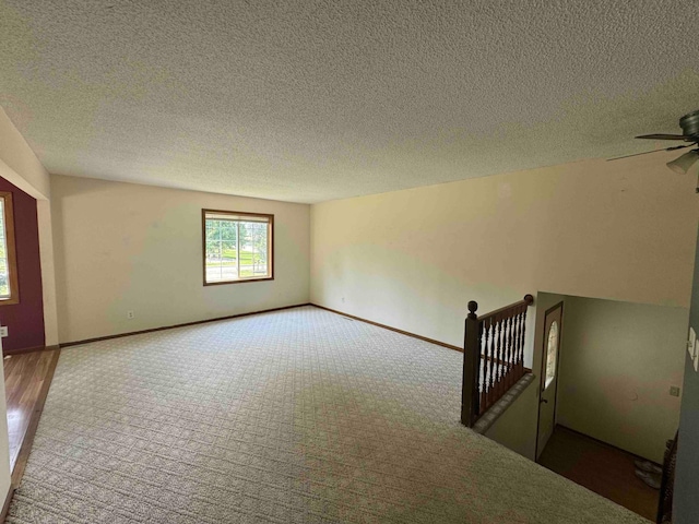 18627 148th St NW, Big Lake Twp, MN 55330 - unfurnished room featuring carpet flooring, ceiling fan, and a textured ceiling