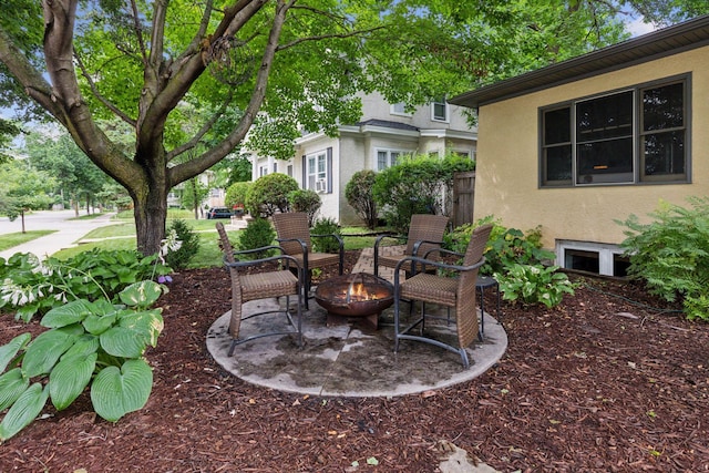2612 52nd St, Minneapolis, MN 55410 - view of yard featuring an outdoor fire pit