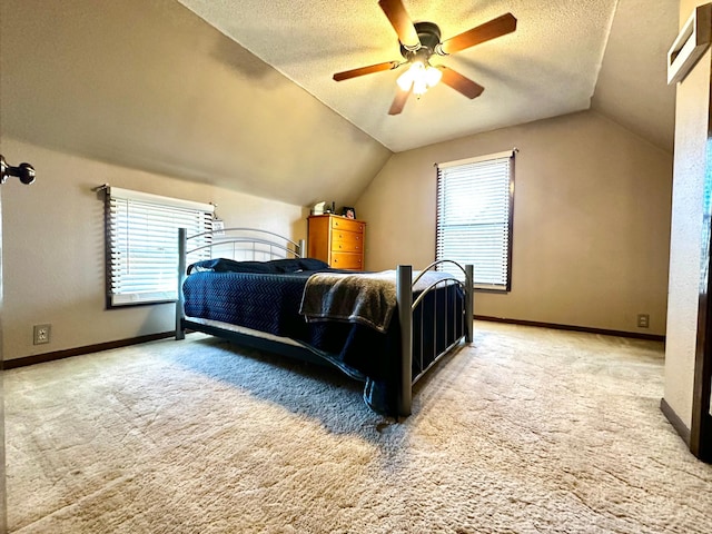 2716 Canterbury Dr, Bigelow, MN 56117 - carpeted bedroom featuring lofted ceiling, a textured ceiling, and ceiling fan
