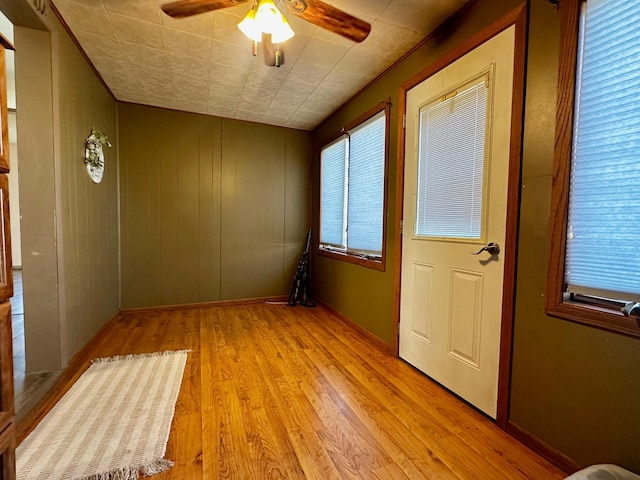 2716 Canterbury Dr, Bigelow, MN 56117 - unfurnished room featuring light wood finished floors, a ceiling fan, and healthy amount of natural light
