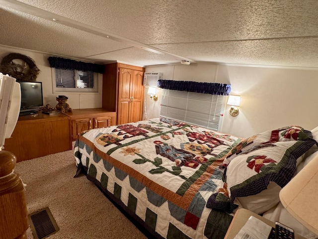 15827 Wilderness Trl Unit 127, Crosslake, MN 56442 - carpeted bedroom with a wall unit AC and a textured ceiling