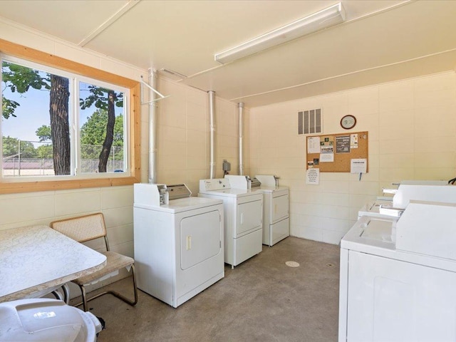 15827 Wilderness Trl Unit 127, Crosslake, MN 56442 - community laundry with separate washer and dryer