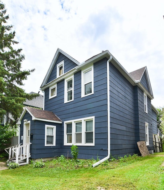 400 Blair Ave, Saint Paul, MN 55103 - rear view of property featuring a lawn
