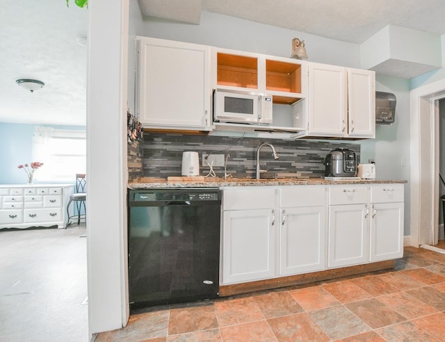 400 Blair Ave, Saint Paul, MN 55103 - kitchen with dishwasher, white microwave, white cabinets, decorative backsplash, and light stone countertops