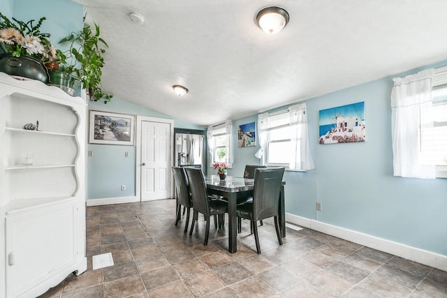 400 Blair Ave, Saint Paul, MN 55103 - dining area with stone finish flooring and lofted ceiling