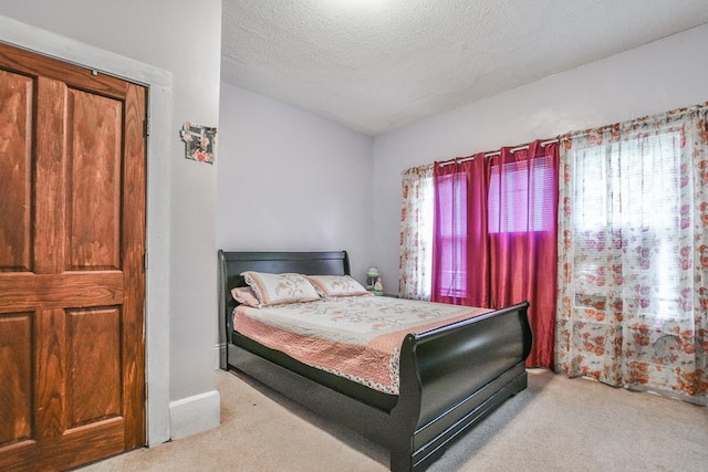 400 Blair Ave, Saint Paul, MN 55103 - carpeted bedroom featuring a textured ceiling and lofted ceiling