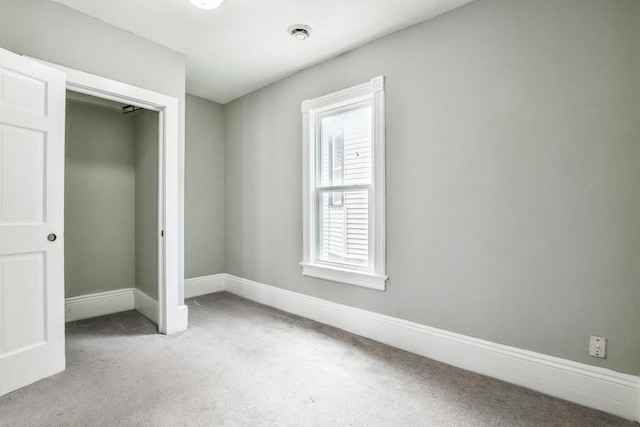 400 Blair Ave, Saint Paul, MN 55103 - unfurnished bedroom featuring light colored carpet and a closet