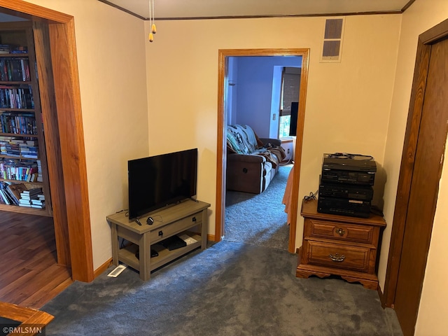 W5168 Lake Rd, Warner Twp, WI 54437 - hall featuring carpet and crown molding