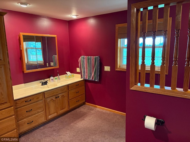 W5168 Lake Rd, Warner Twp, WI 54437 - bathroom featuring vanity and baseboards