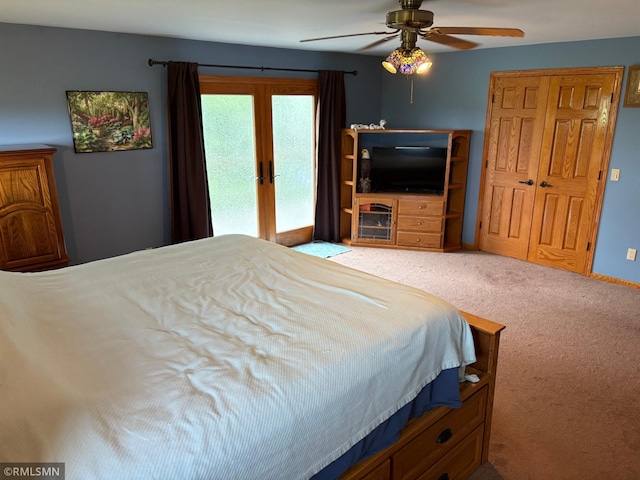W5168 Lake Rd, Warner Twp, WI 54437 - bedroom with carpet flooring, access to outside, french doors, and ceiling fan