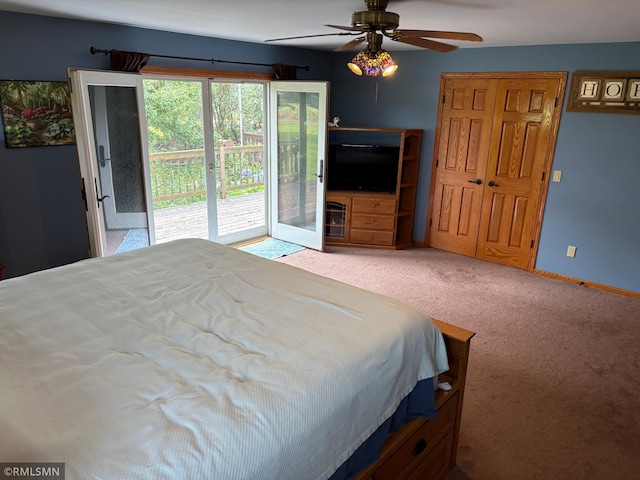 W5168 Lake Rd, Warner Twp, WI 54437 - bedroom with access to outside, carpet flooring, and ceiling fan